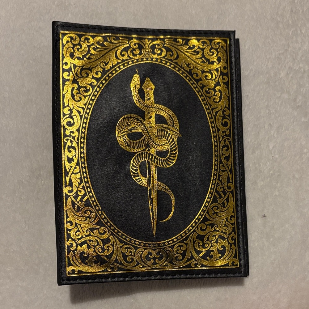 Black and Gold Snake pin or earring Book
